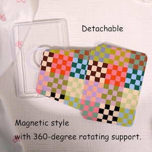 May include: A multi-coloured phone case with a checkerboard design in pink, orange, green, and brown. The case is labelled "Detachable" and "Magnetic style with 360-degree rotating support."
