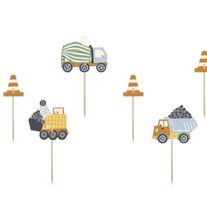 May include: Set of six construction themed cake toppers. The toppers feature a cement mixer truck, a dump truck, a backhoe, and three orange traffic cones. The toppers are made of cardstock and are perfect for a construction-themed birthday party.