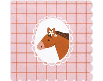 Puede incluir: Servilletas de papel a cuadros rosa y naranja con borde festoneado. Un marco ovalado blanco con una cabeza de caballo marrón con flores blancas en la cabeza está en el centro de la servilleta.