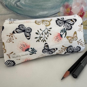 Estuche acolchado con alas doradas para lápices y gafas – Bolsa de tela de 20 x 13 cm – Bolsa con cremallera hecha a mano para bolígrafos, brochas de maquillaje, tampones o gafas