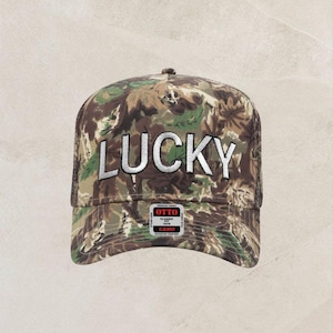 Camo “Lucky” Trucker Hat