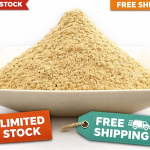 May include: A mound of light brown powder sits in a white, square, shallow bowl. The bowl is on a white background. An orange tag reads "LIMITED STOCK", and a teal tag says "FREE SHIPPING".