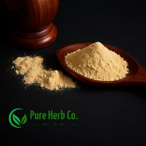May include: A wooden spoon filled with light brown powder, with some spilled on a black surface. A wooden mortar and pestle are in the background. The Pure Herb Co. logo is visible in the lower left corner.