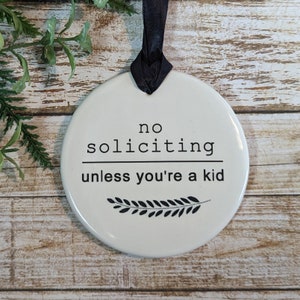 Sign: No Soliciting, Kid Friendly