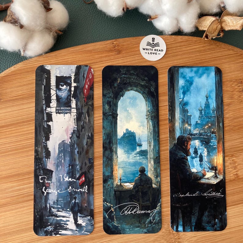 May include: Three rectangular bookmarks with literary themes. One depicts a street scene with the text "Big Brother is Watching" and "George Orwell." Another shows a person at a desk with a view. The third bookmark shows a person writing by candlelight.