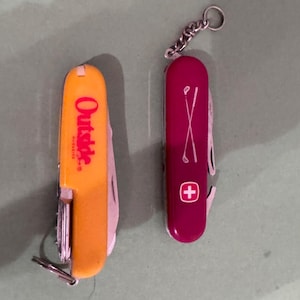 2 vintage pocket knives. Wenger golf pro & Outside magazine