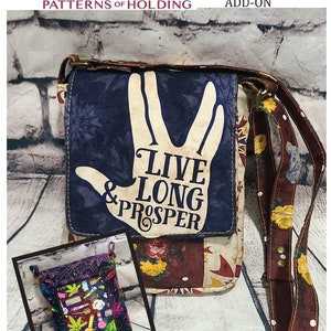 May include: A soft-bodied crossbody bag with a flap featuring the Vulcan salute and the words "Live Long & Prosper." The bag is approximately 7" wide, 9" tall, and 2" deep. It has multiple pockets and applique options.