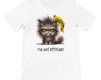 May include: White t-shirt with a cartoon illustration of a black cat with a yellow "CAUTION" sign. The text "I'VE GOT ATTITUDE!" is printed below the cat.