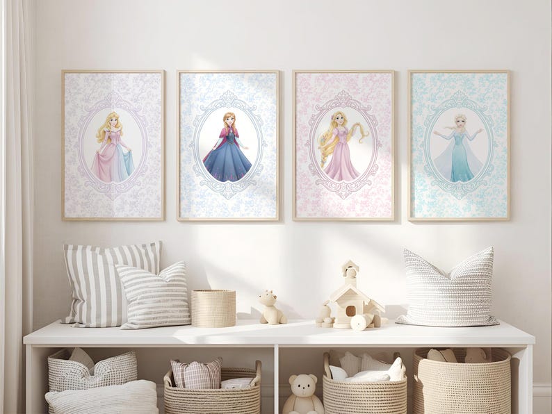 May include: Four framed art prints featuring princess illustrations in oval frames. Each princess is depicted in a colorful gown against a patterned background. The frames are displayed above a white shelf with decorative items.