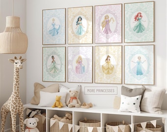 May include: Eight framed wall art prints featuring various animated princesses in ornate oval frames, arranged in two rows of four. Each print displays a different character in a unique color palette, with the text MORE PRINCESSES visible.