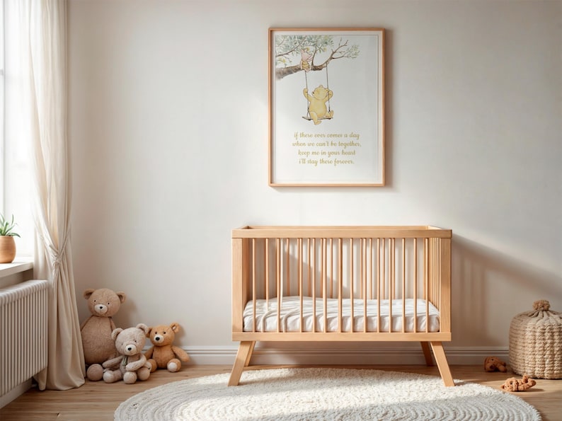 May include: A nursery scene featuring a light wood crib with a mattress, a framed Winnie the Pooh print, and several teddy bears. The print shows Pooh on a swing. A white rug and a woven basket complete the cozy, neutral-toned decor.