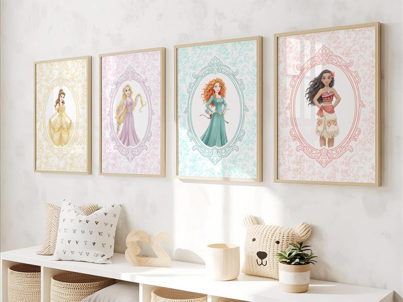 May include: Four framed art prints featuring Disney princesses: Belle in a yellow gown, Rapunzel in a purple dress, Merida in a teal dress, and Moana in a red top and floral skirt. Each princess is set against a patterned background within an oval frame.