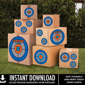 May include: A stack of cardboard boxes with target designs printed on them. The boxes are decorated with blue, orange, and grey circles. The text "JACKSON IS TURNING 5" is printed on one of the boxes.