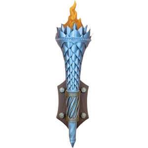 May include: A silver-colored wall-mounted torch with a stylized flame. The torch has a textured, diamond-patterned body and is mounted on a brown wooden plaque with decorative metal studs. The flame is a bright yellow-orange.