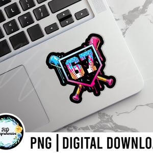 May include: A colorful baseball-themed sticker with the text "67" inside a shield, crossed bats, and dripping paint effects. The sticker is on a laptop. The words "PNG | DIGITAL DOWNLOAD" are at the bottom.