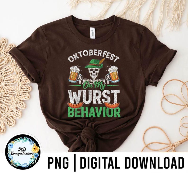 May include: A brown t-shirt with the text "Oktoberfest On My Wurst Behavior" in white and green. The design includes a skull wearing a green hat, beer mugs, and sausages. The shirt is a digital download.