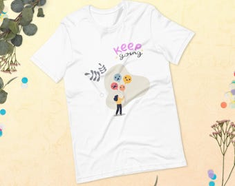 Camiseta motivacional con gráfico de ánimo "Sigue adelante"