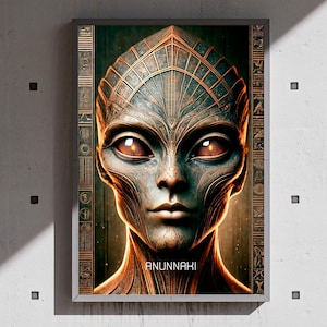 May include: A framed digital art print featuring a detailed portrait of an alien with large, amber eyes. The alien's skin is a mix of teal and bronze, with intricate patterns. The word "ANUNNAKI" is printed at the bottom.