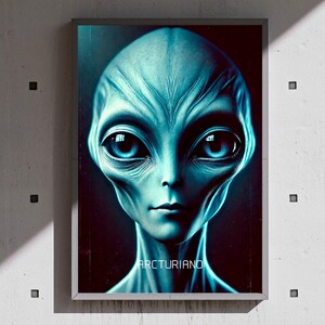 May include: A framed digital art print featuring a teal-colored alien with large, expressive eyes. The alien's face is centered, with the word "ARCTURIANO" at the bottom. The artwork has a dark background and is mounted on a white wall.
