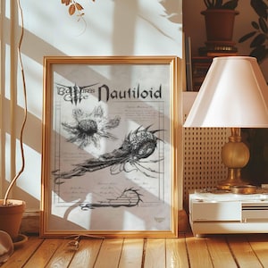 May include: A framed print with a gold frame featuring a detailed black and white illustration of a nautiloid, with the text "Baldur's Gate Nautiloid". The artwork is displayed on a wooden surface, with a lamp and other decor in the background.