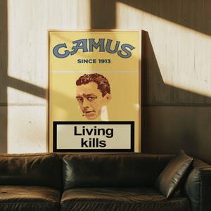 May include: A framed poster with a yellow background. It features the name "GAMUS" in blue, and the text "SINCE 1913". The poster includes a portrait of a man and the words "Living kills" in a white box. The poster is above a dark brown leather couch.