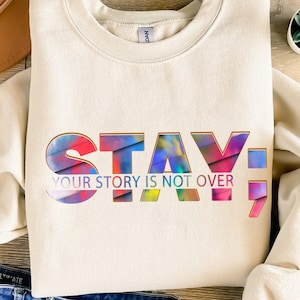 Stay Positive Inspirational PNG Design - 'Your Story is Not Over' Vibrant and Uplifting Artwork - Perfect for Mental Health Awareness