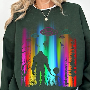 Bigfoot and Alien PNG - Rainbow UFO Abduction Clipart - Sublimation Design for T-Shirts, Sci-Fi Apparel, and Outer Space Gifts