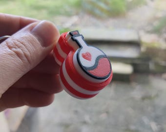 'Love Potion' Clicker Keychain.