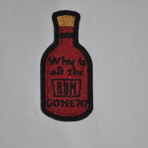 May include: Red embroidered patch shaped like a bottle with the text "Why is all the rum gone?"