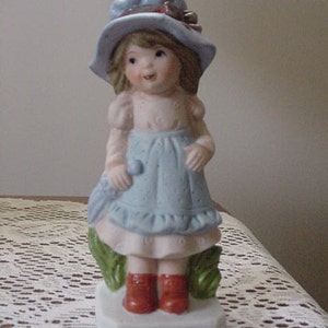 Vintage Girl with Bonnet and Umbrella Figurine