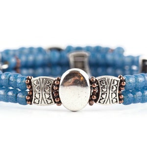 Button and Bows French Blue Cuff Memory Wire Bracelet on white background
