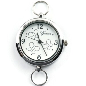 Reloj de pulsera redondo plateado con forma de mariposa • Esfera blanca • Reloj para manualidades con cuentas • Creación de joyas • Analógico • Incluye bucles y batería imagen 3