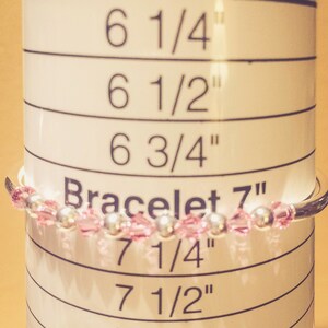 October Rose Swarovski Crystal Birth Month Sterling Silver Plated Bracelet on bracelet measuring cone