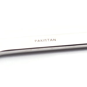 May include: A silver wrench with the word "PAKISTAN" engraved on the handle.