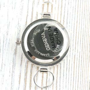 Orologio rotondo con quadrante bianco e finitura argentata a forma di dente di leone • Orologio fai da te con perline • Creazione di gioielli • Analogico • Anelli e batteria inclusi immagine 2