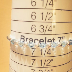 March Aquamarine Swarovski Crystal Birth Month Sterling Silver Plated Bracelet on bracelet cone