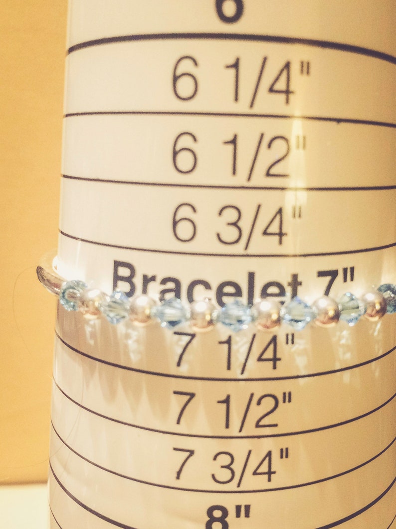 March Aquamarine Swarovski Crystal Birth Month Sterling Silver Plated Bracelet on bracelet cone