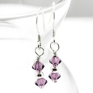 February Amethyst Swarovski Crystal Birth Month Sterling Silver Drop Earrings hanging on vase