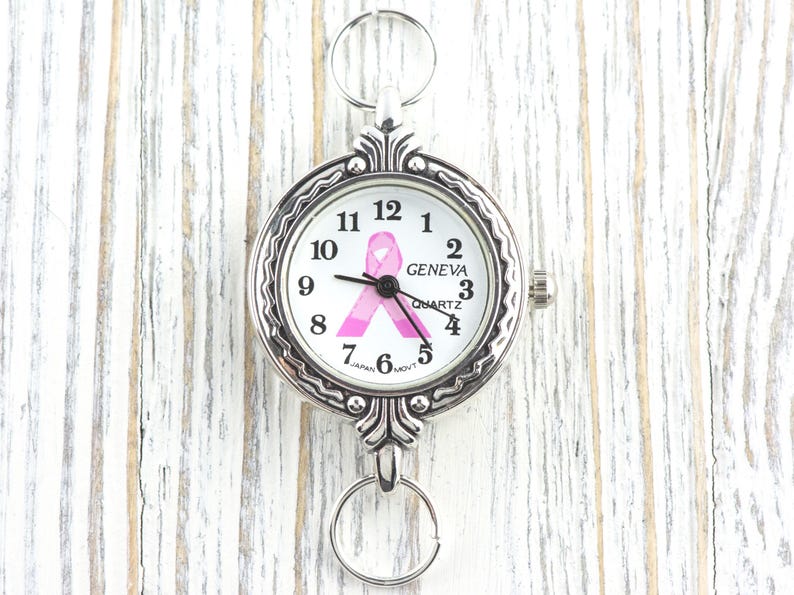 Pink Ribbon Silberfarbenes Zifferblatt • Weißes Zifferblatt • DIY Perlen Uhr • Schmuckherstellung • Analog • Schlaufen und Batterie enthalten Bild 1