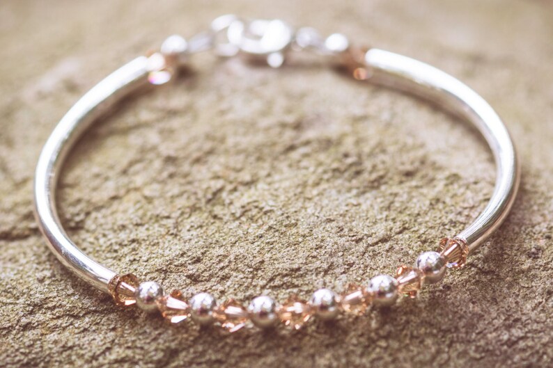 November Topaz Swarovski Crystal Birth Month Sterling Silver Plated Bracelet on stone