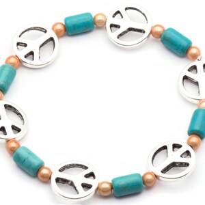 May include: A turquoise and copper beaded bracelet with silver peace sign charms.