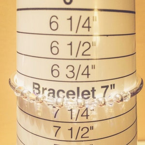 April Diamond Swarovski Crystal Birth Month Sterling Silver Plated Bracelet on bracelet measuring cone