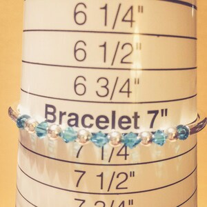 December Blue Zircon Swarovski Crystal Birth Month Sterling Silver Plated Bracelet on bracelet measuring cone