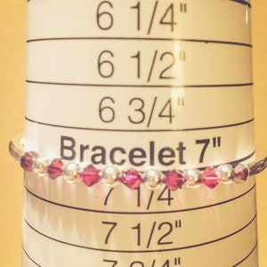 July Ruby Swarovski Crystal Birth Month Sterling Silver Plated Bracelet on bracelet measuring cone