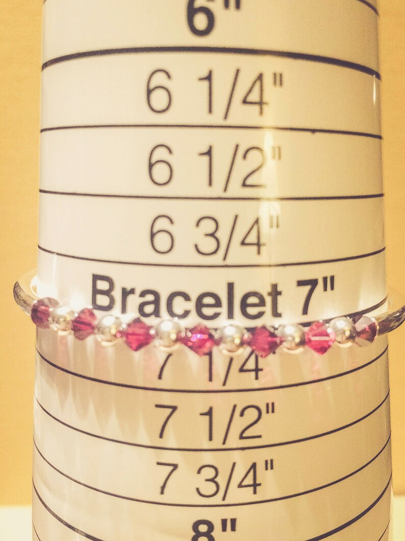 July Ruby Swarovski Crystal Birth Month Sterling Silver Plated Bracelet on bracelet measuring cone