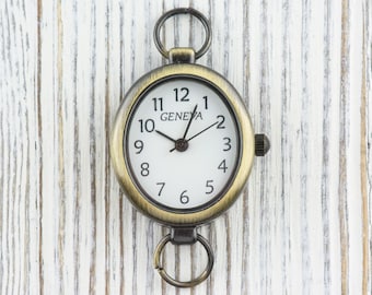 Reloj ovalado de oro antiguo • Esfera blanca • Reloj para manualidades con cuentas • Creación de joyas • Analógico • Incluye bucles y batería