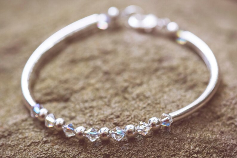 April Diamond Swarovski Crystal Birth Month Sterling Silver Plated Bracelet on stone