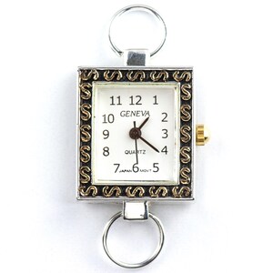 Peut inclure: Montre Geneva carr&eacute;e &agrave; quartz avec cadran blanc, chiffres noirs et aiguilles dor&eacute;es. Le bo&icirc;tier argent&eacute; est orn&eacute; d'une bordure d&eacute;corative dor&eacute;e et noire, avec un anneau argent&eacute; en haut et en bas.