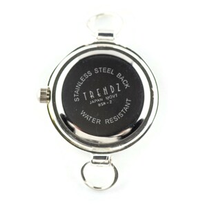 May include: A silver watch with a black face. The watch back reads "TRENDZ JAPAN MOVT BSR-2 WATER RESISTANT STAINLESS STEEL BACK." It has a circular design, a crown, and two loops for attachment.