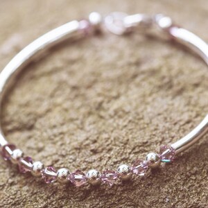 June Alexandrite Swarovski Crystal Birth Month Sterling Silver Plated Bracelet on stone